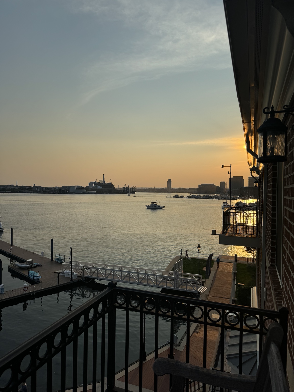 Waterfront sunset viewed from a Canton balcony